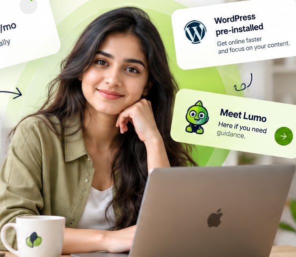 Website creator smiling while working at her laptop